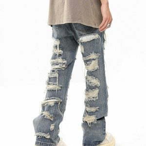 edgy multi hole jeans for a youthful urban look 8740