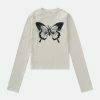 youthful butterfly cutout top   sleek long sleeve design 8487
