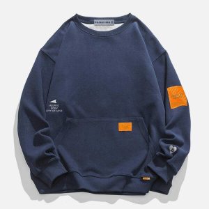 youthful orange labeled sweatshirt   trendy streetwear gem 6936